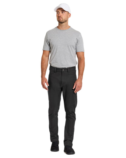 Black coloured Didriksons Mens Dennis Pants on white background 
