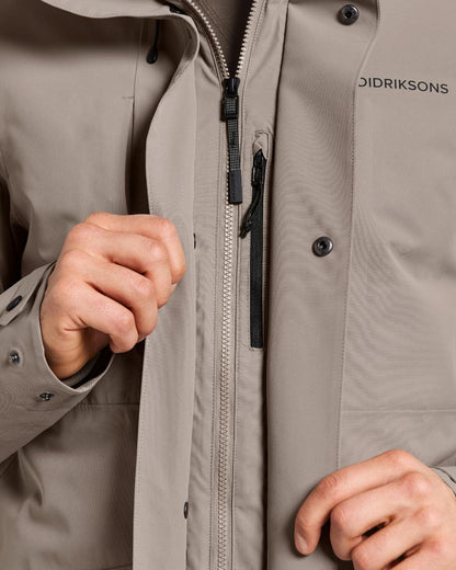 Ash Brown Coloured Didriksons Mens Falke Parka on white background 