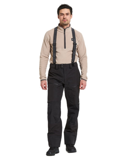 Black coloured Didriksons Mens Fractus Pants on white background 