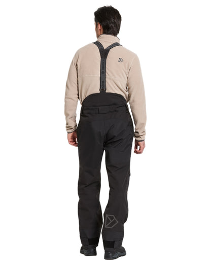 Black coloured Didriksons Mens Fractus Pants on white background 