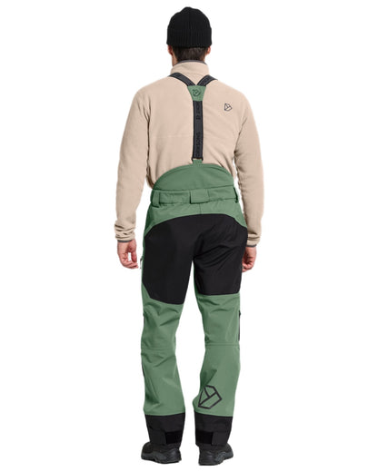 Dark Moss coloured Didriksons Mens Fractus Pants on white background 