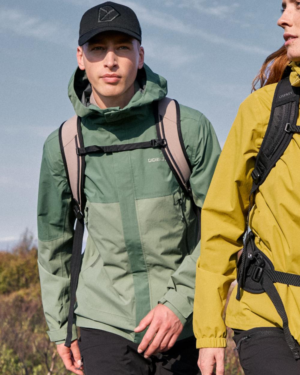 Light Moss coloured Didriksons Mens Grit Jacket 4 on mountain background 
