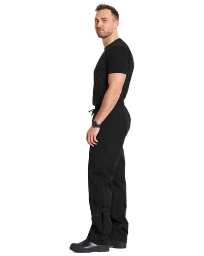 Black coloured Didriksons Mens Grit Rain Pants on white background 