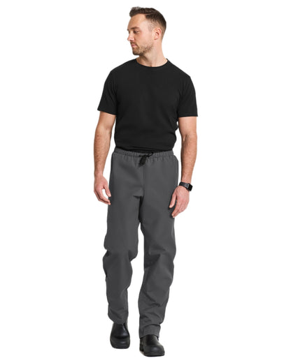 Coal Black coloured Didriksons Mens Grit Rain Pants on white background 