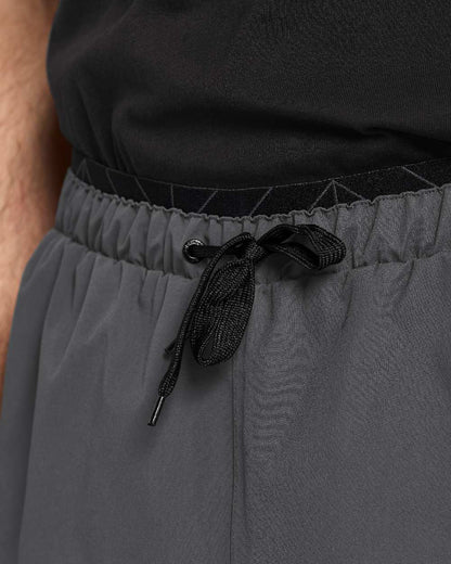 Coal Black coloured Didriksons Mens Grit Rain Pants on white background 