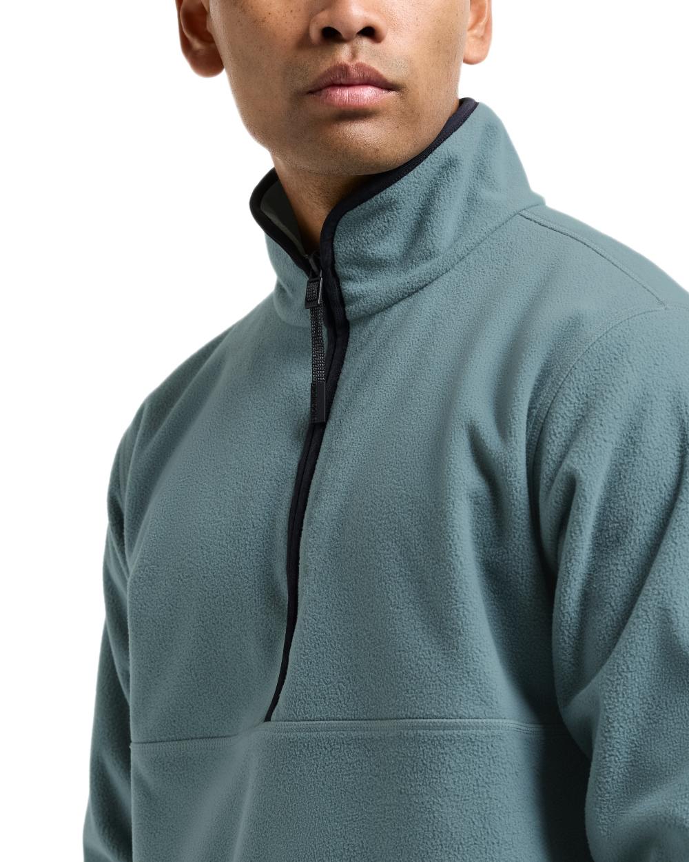Factory Blue coloured Didriksons Mens Hannes Half Zip Sweater on white background 