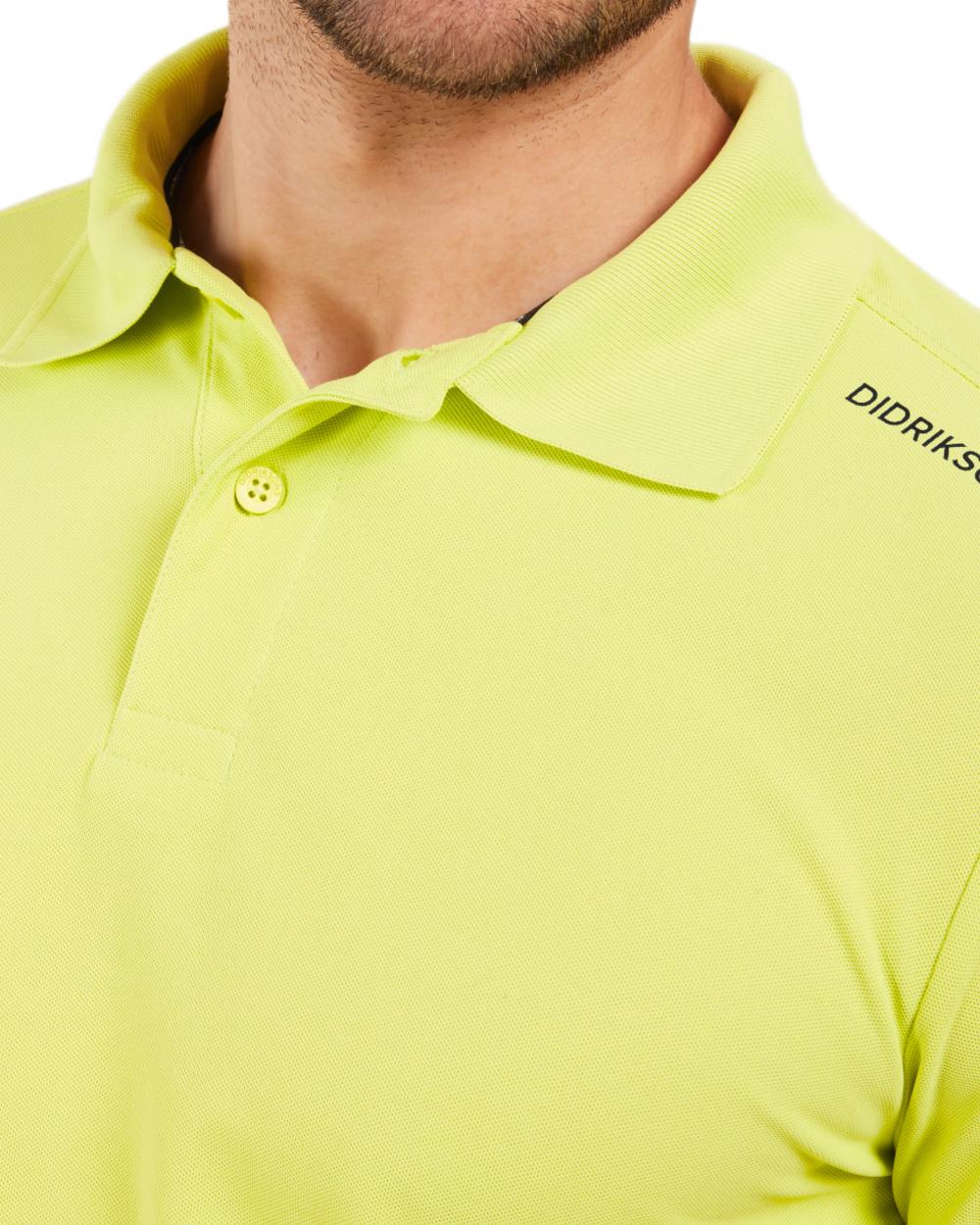 Light Avocado coloured Didriksons Mens Jack Polo T-Shirt on white background 