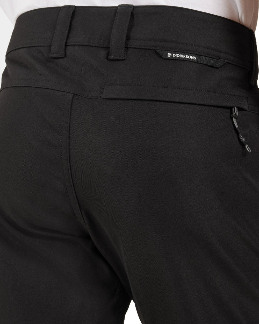 Black coloured Didriksons Mens Pavo Pants on white background 