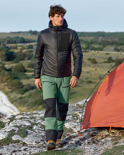 Black coloured Didriksons Mens Sander Jacket on mountain background 