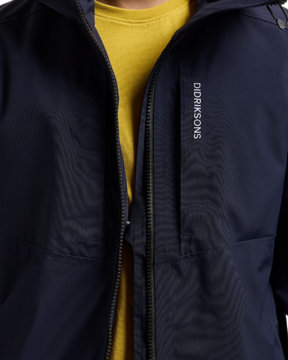 Dark Night Blue coloured Didriksons Mens Soren Parka on white background 