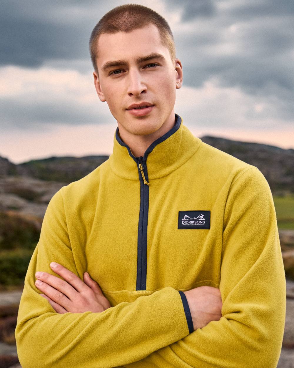 Yellow Pollen coloured Didriksons Mens Vito USX Half Zip Sweater on beach background 