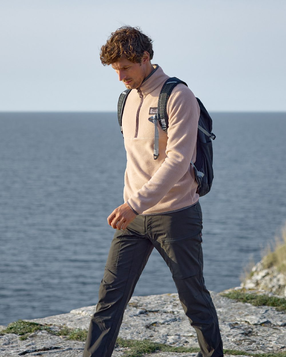 Beach Biege coloured Didriksons Mens Vito USX Half Zip Sweater on coastal background 