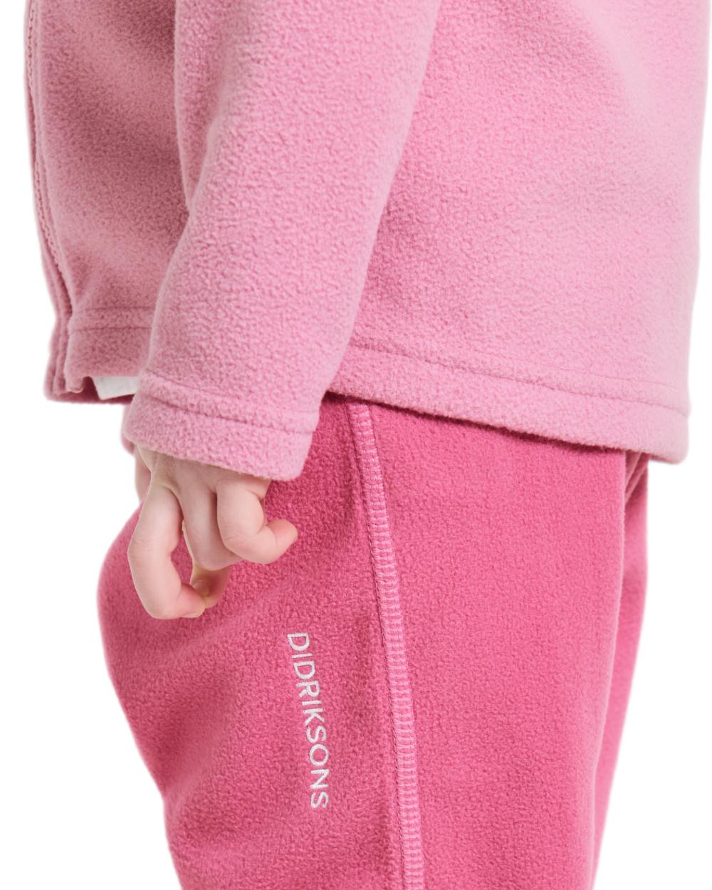 Light Heather Pink coloured Didriksons Monte Kids Fullzip Fleece on white background 