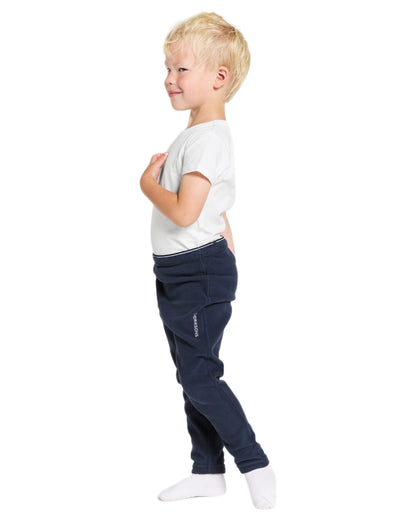 Navy coloured Didriksons Monte Kids Pants on white background 