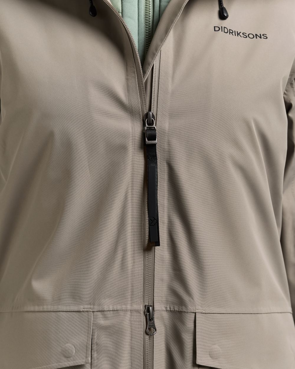 Ash Brown coloured Didriksons Nadja Womens Long Parka 4 on white background 