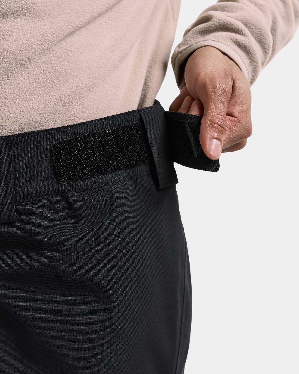 Black coloured Didriksons Niva Mens Pants on white background 