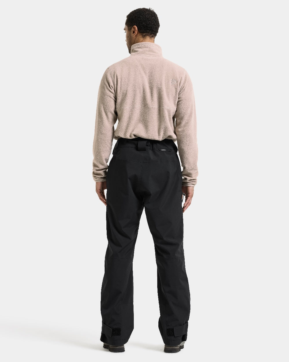 Black coloured Didriksons Niva Mens Pants on white background 