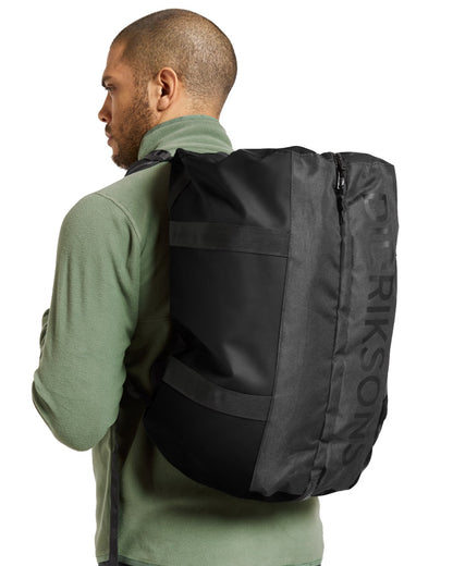 Black coloured Didriksons Sauda Duffel Bag on white background 