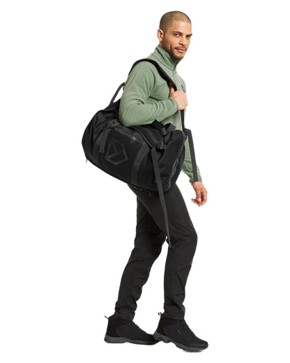 Black coloured Didriksons Sauda Duffel Bag on white background 