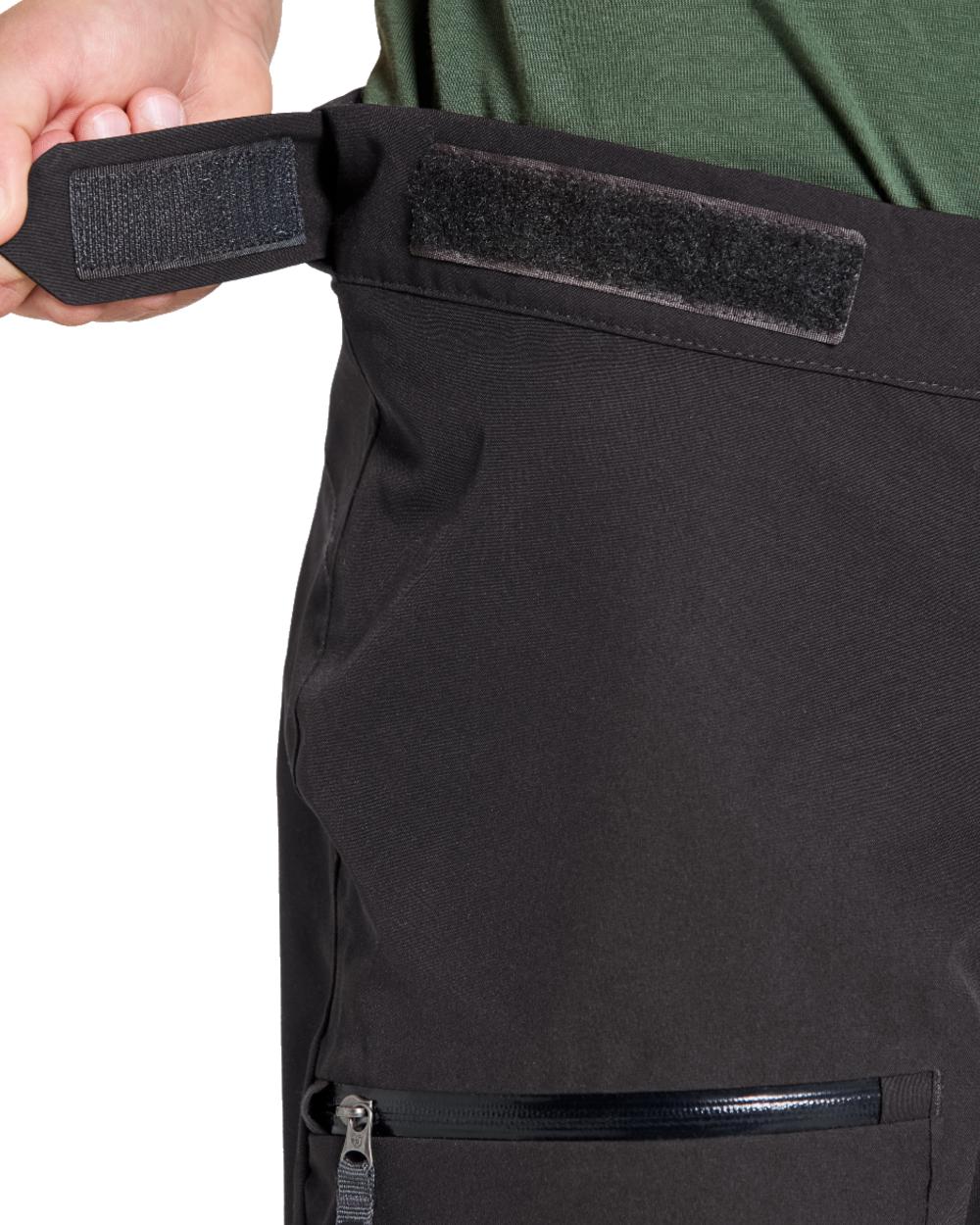 Black coloured Didriksons Childrens Svalort Pants on white background 