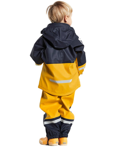 Oat Yellow coloured Didriksons Waterman Kids Rain Set on white background 