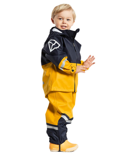 Oat Yellow coloured Didriksons Waterman Kids Rain Set on white background 