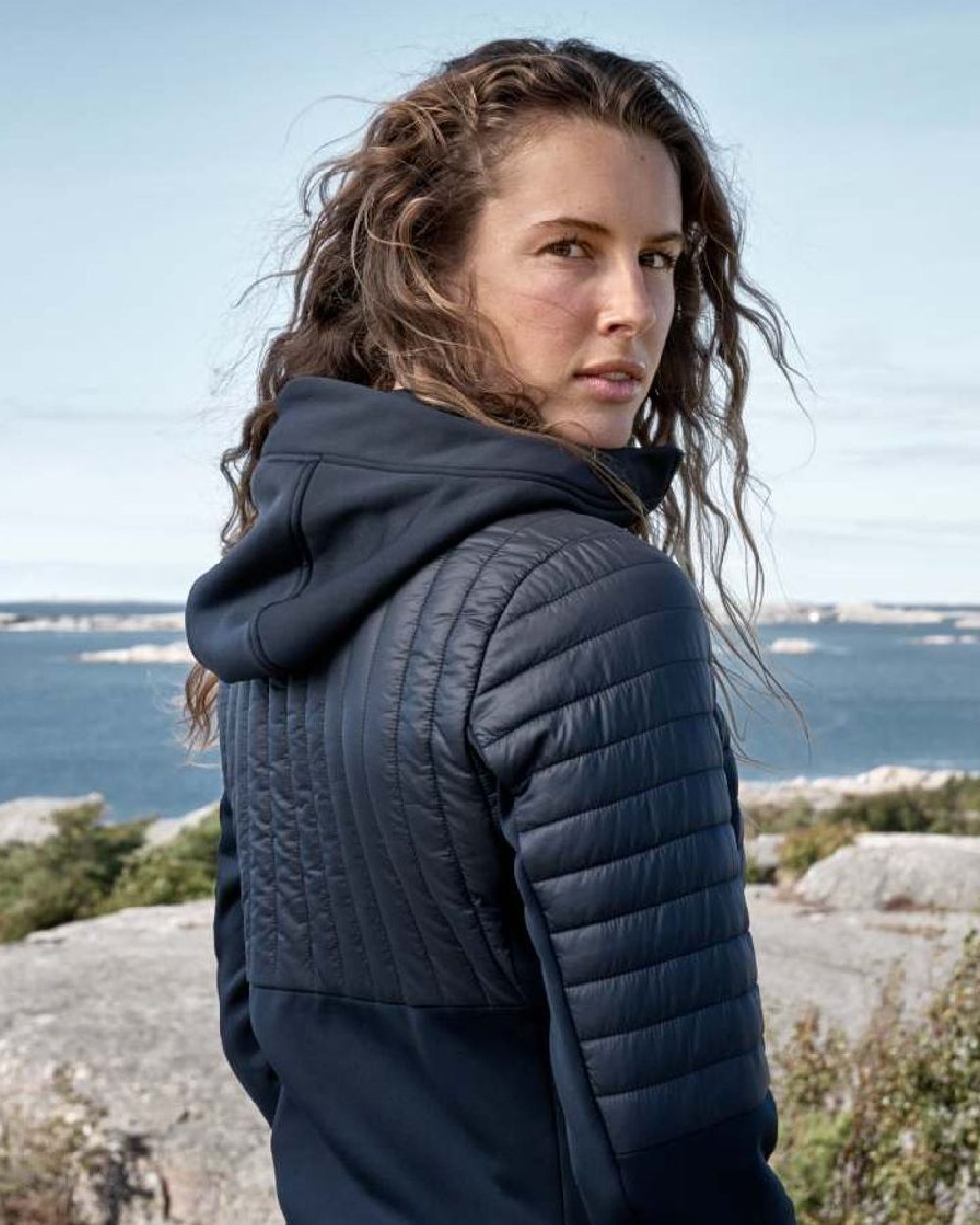 Dark Night Blue coloured Didriksons Womens Annema Full Zip 6 on lake background 