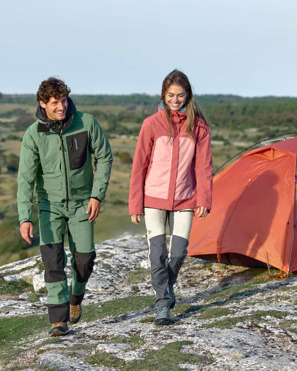 Pink Blush coloured Didriksons Womens Grit Jacket 3 on campsite background 