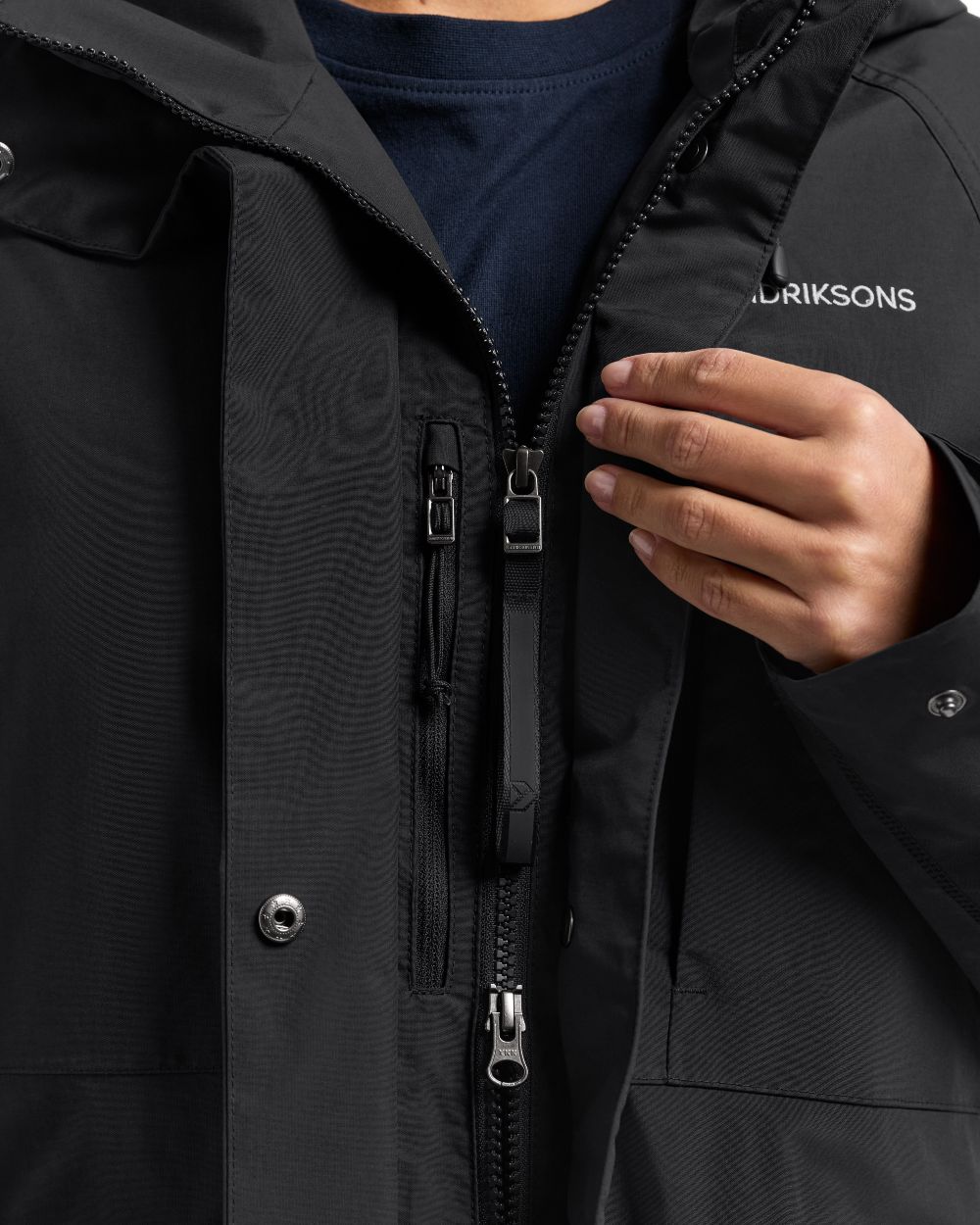 Black coloured Didriksons Womens Louise Long Parka on white background 