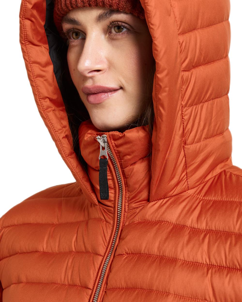 Rust coloured Didriksons Womens Lykke Long Parka on white background 