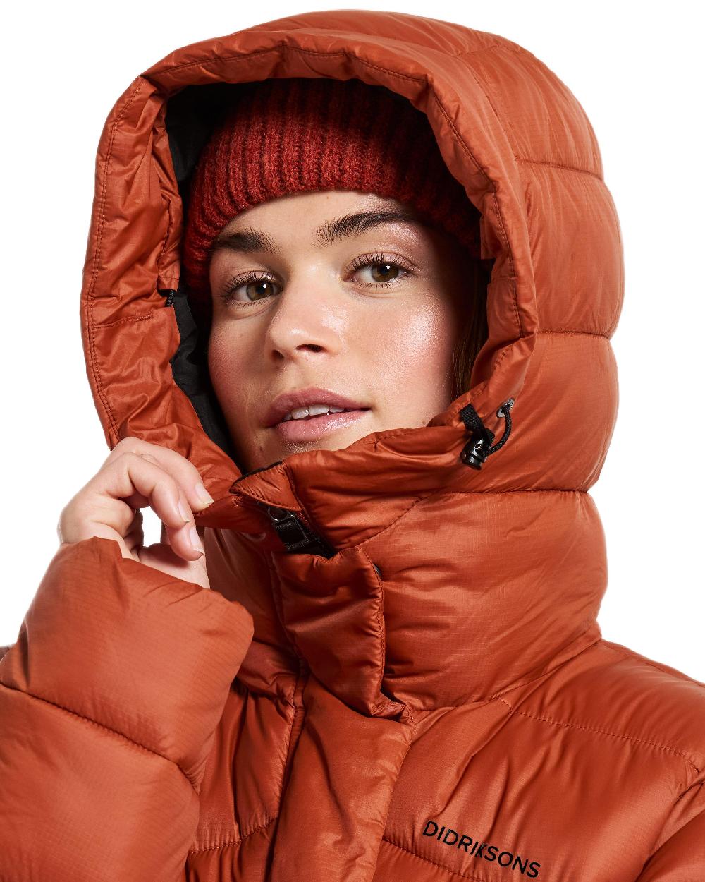 Rust Coloured Didriksons Womens Marion Parka on white background 