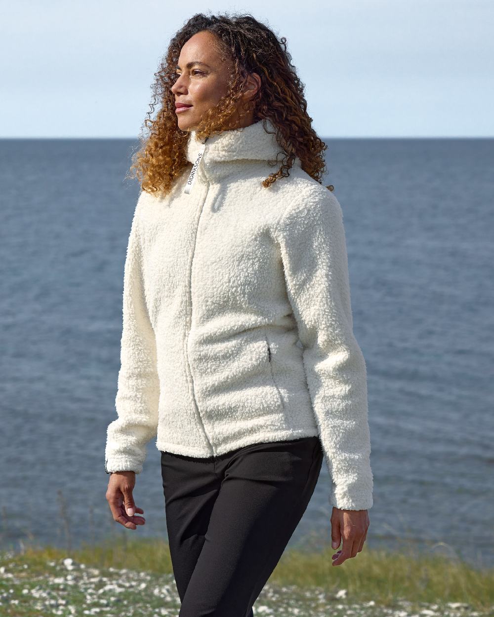 Black coloured Didriksons Womens Mary Pants on sea background 