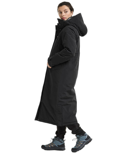 Black coloured Didriksons Womens Neja Long Parka on white background 