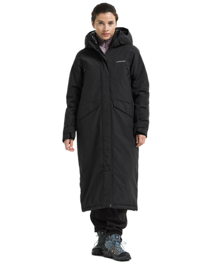 Black coloured Didriksons Womens Neja Long Parka on white background 
