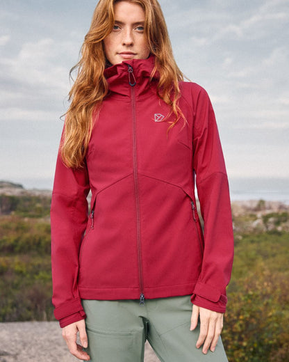 Spring Red coloured Didriksons Womens Petra Jacket on mountain background 