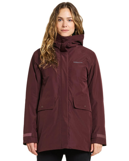 Old Rust Coloured Didriksons Womens Tuva Parka on white background 