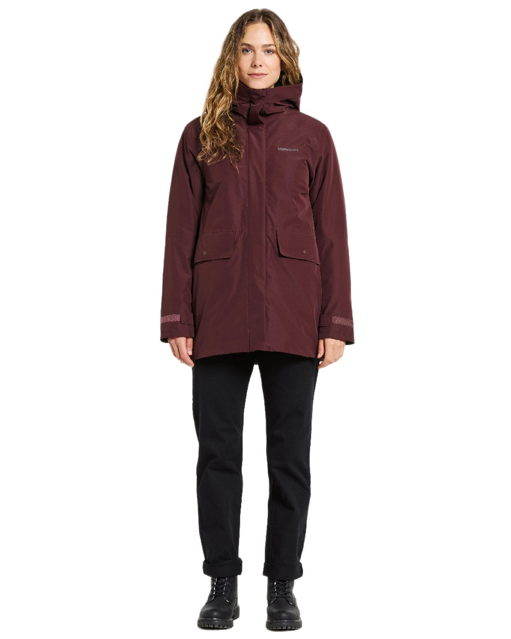 Old Rust Coloured Didriksons Womens Tuva Parka on white background 