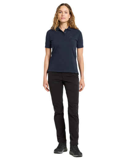 Dark Night Blue coloured Didriksons Womens Wivi Polo T-Shirt on white background 