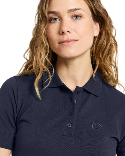 Dark Night Blue coloured Didriksons Womens Wivi Polo T-Shirt on white background 