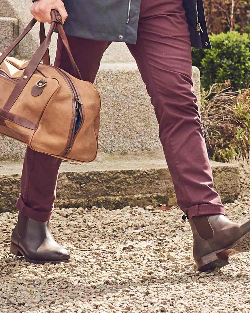 Mahogany coloured Dubarry Antrim Country Boots on stone background 