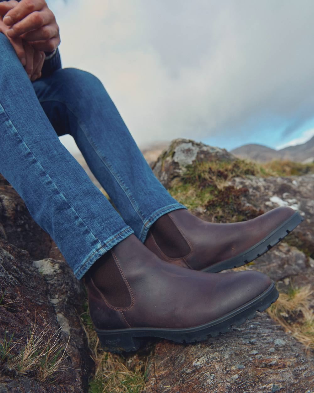 Mahogany coloured Dubarry Antrim Country Boots on rock background 