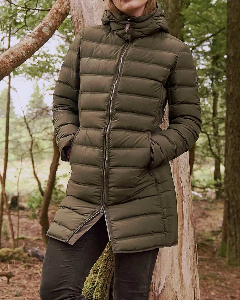 Olive coloured Dubarry Ballybrophy Quilted Jacket on tree background 