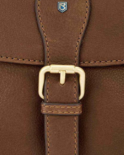 Walnut coloured Dubarry Balrickard Saddle Bag on white background 