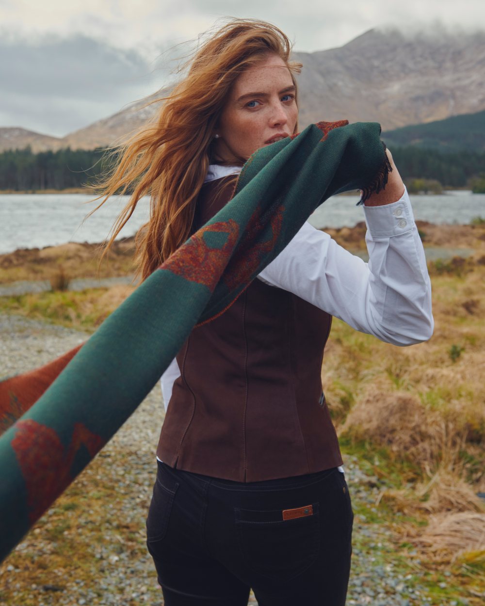 Ivy Coloured Dubarry Birchdale Wool Stole on mountain background 