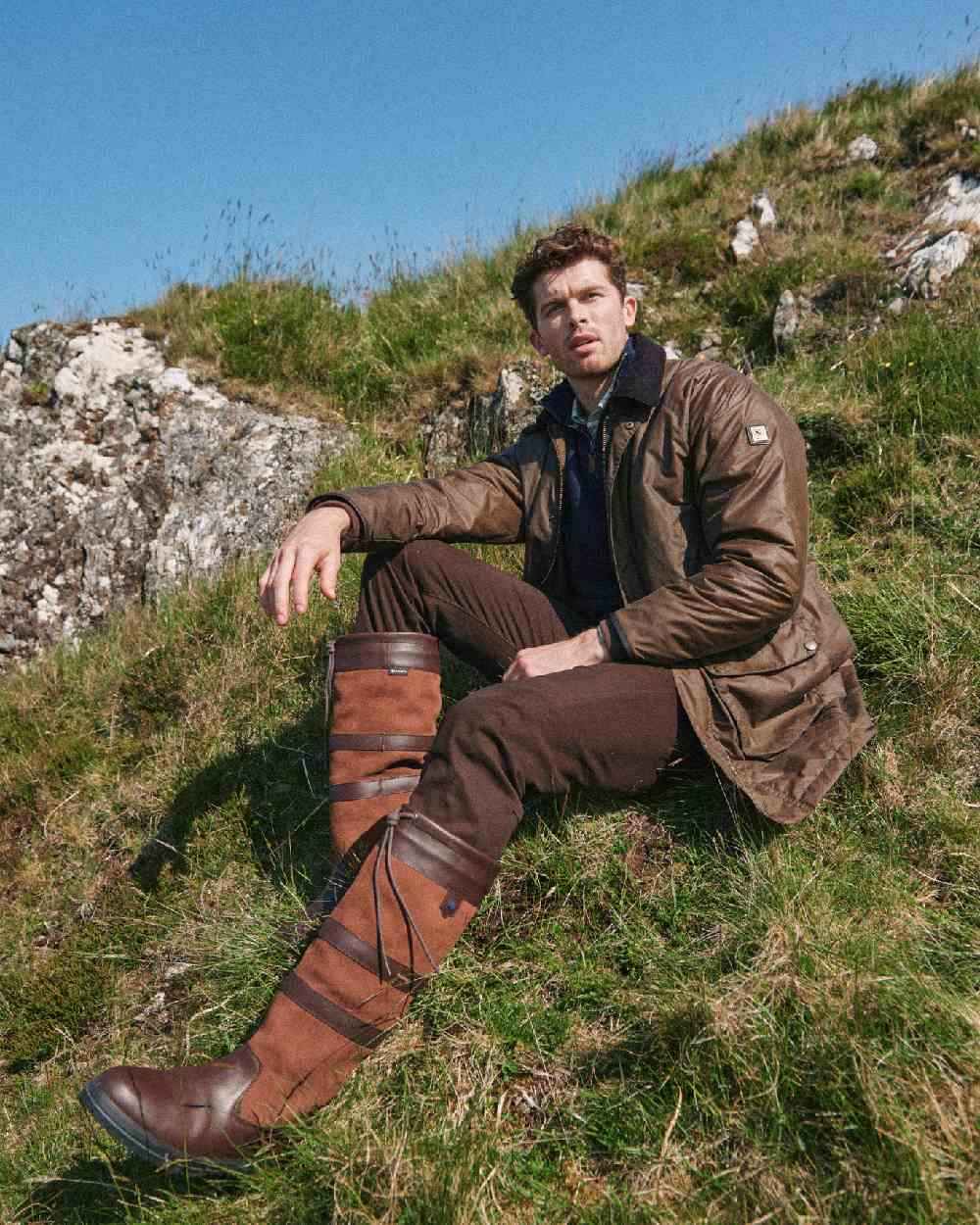 Ginger Coloured Dubarry Brunswick Wax Jacket on mountain background 