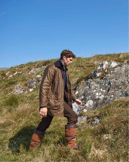 Ginger Coloured Dubarry Brunswick Wax Jacket on mountain background 