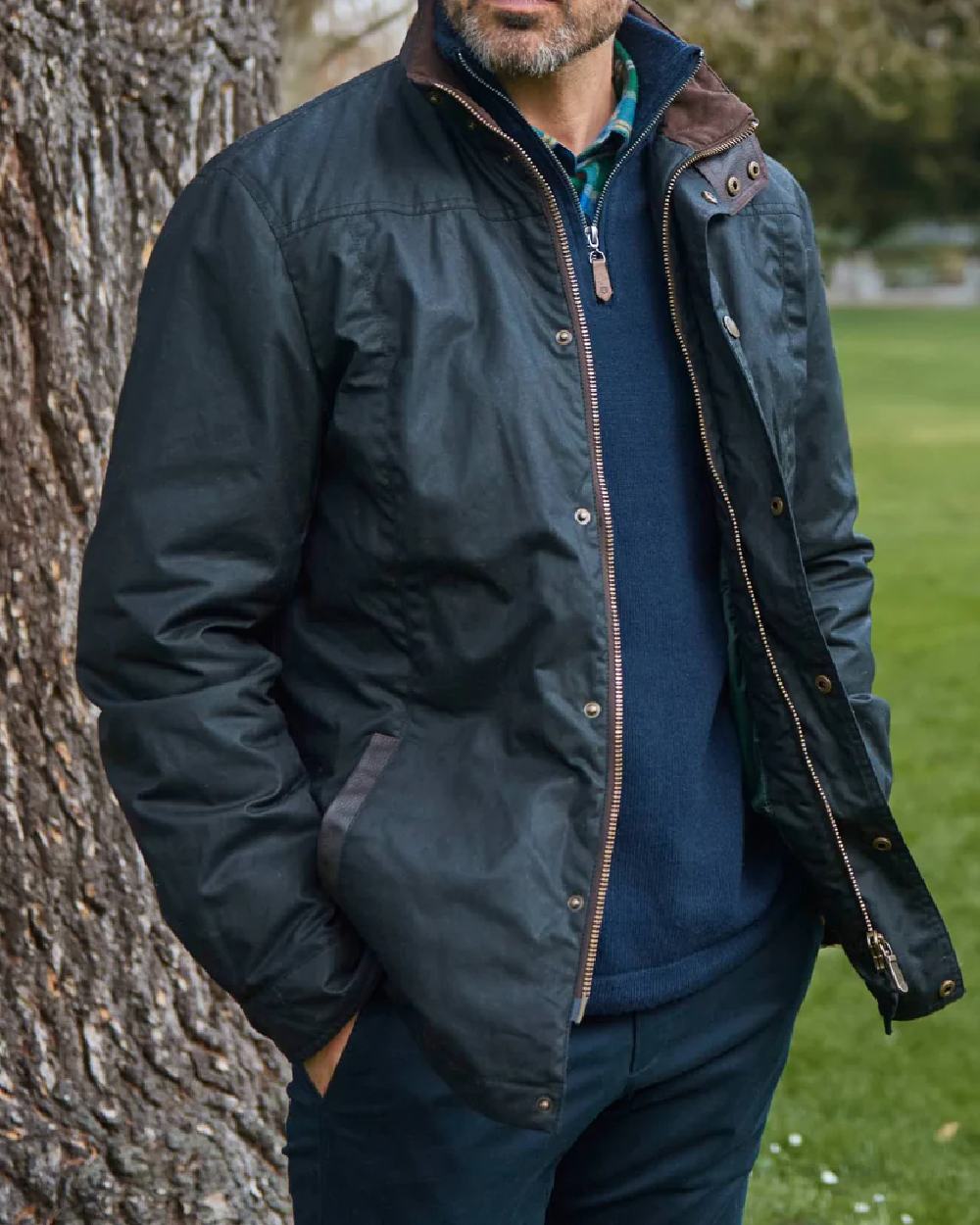 Black Coloured Dubarry Carrickfergus Waxed Jacket on garden background 