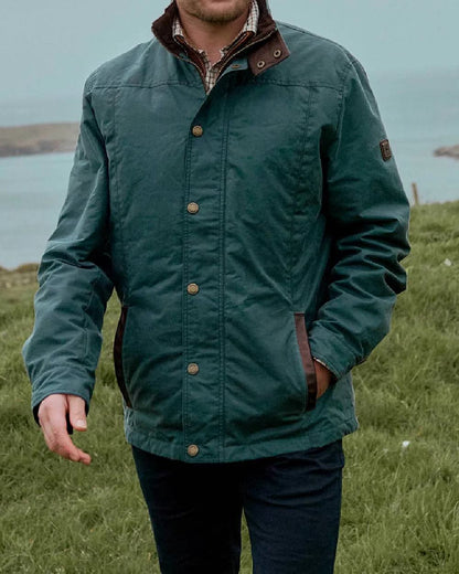 Dark Pebble Coloured Dubarry Carrickfergus Waxed Jacket on river  background 