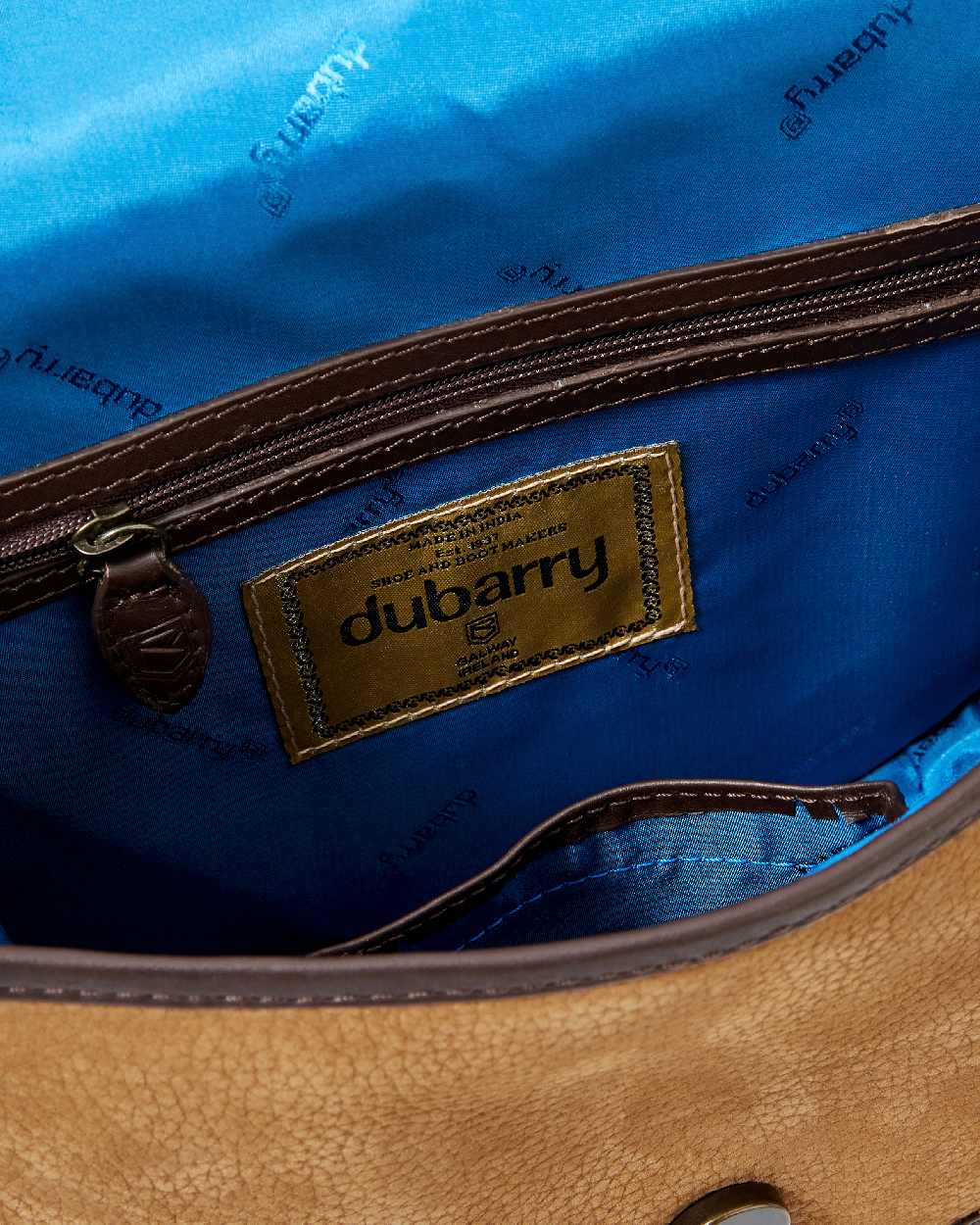 Brown coloured Dubarry Clara Leather Saddle Bag on white background 