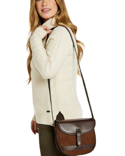 Walnut coloured Dubarry Clara Leather Saddle Bag on white background 